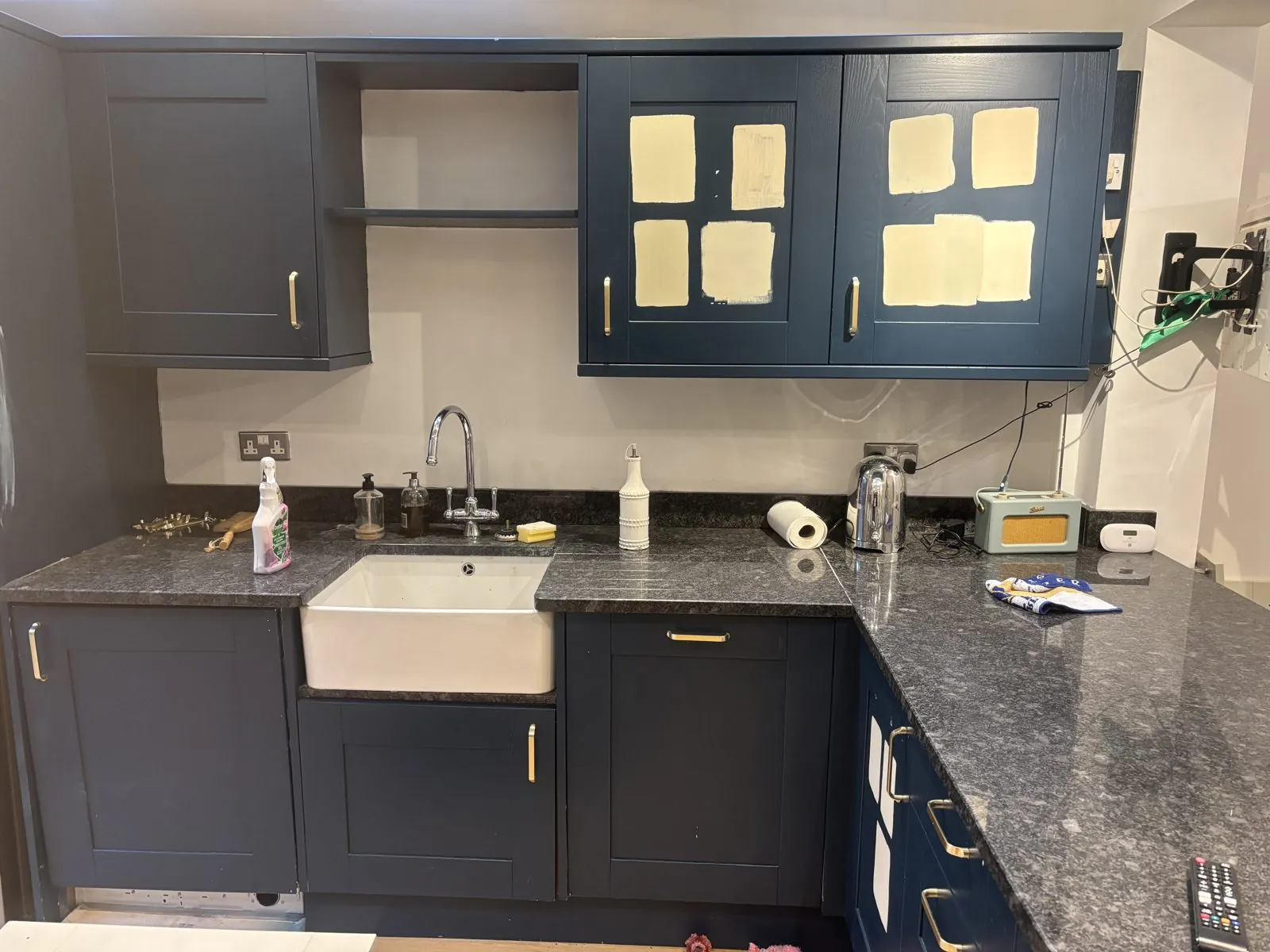Navy kitchen respray with wood worktops